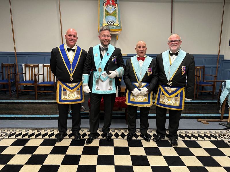 Beneath the lodge banner