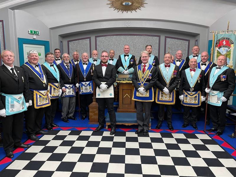 A newly initiated member with the Brethren of Plumstead Lodge